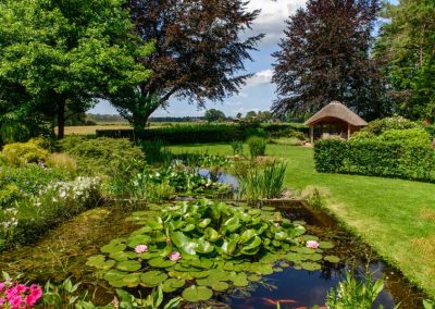 Tuinvoorbeeld Groene Tuin Met Houten Overkapping De Brinker Tuinen 11