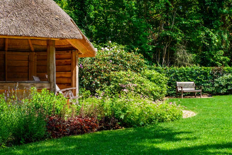 Tuinvoorbeeld Groene Tuin Met Houten Overkapping De Brinker Tuinen 9